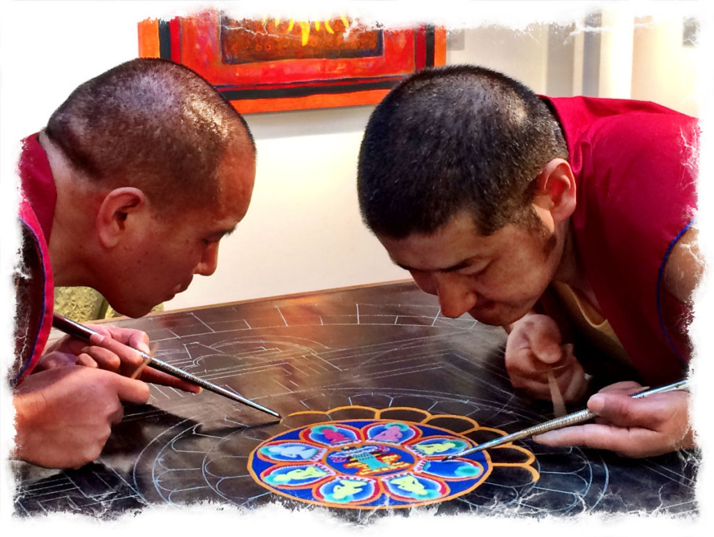 Members of our community drop in all day long to watch the mandala grow. 