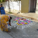 Chalk mandalas are drawn within doorways for blessings and protection.